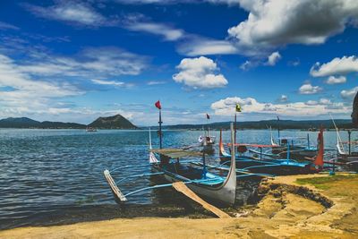 Scenic view of sea against cloudy sky