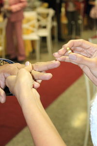 Close-up of woman holding hands