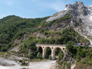 Bridge of vara in carrara, site of the old private marble railway - tuscany, italy.