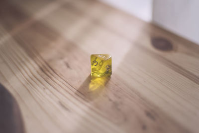 Dice on wooden table