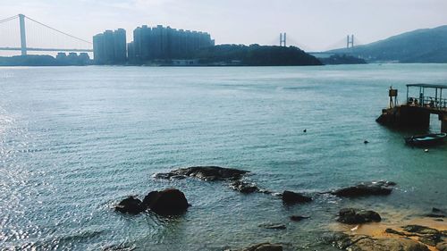 Scenic view of bay against sky