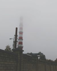 Low angle view of traditional windmill against clear sky