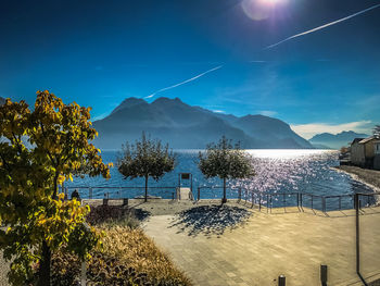 Panoramic view of landscape against blue sky