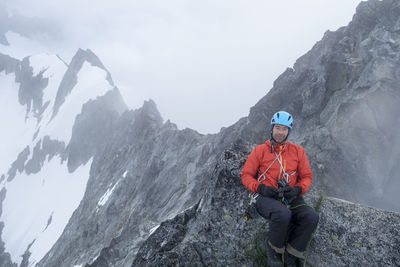 A man climbing forbidden peak in washington