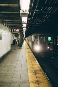 Train at railroad station at night