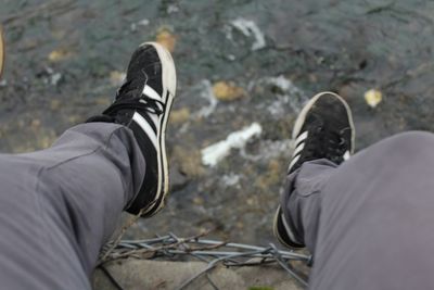 Low section of man standing outdoors