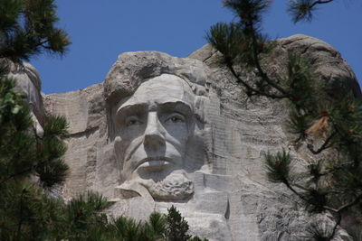 Low angle view of statue against clear sky