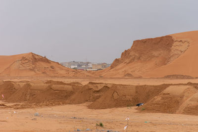 Scenic view of desert against sky