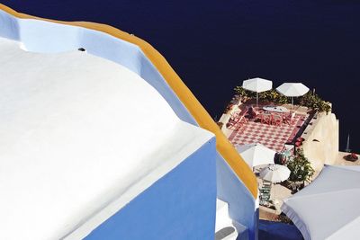 High angle view of restaurant seats with sea view