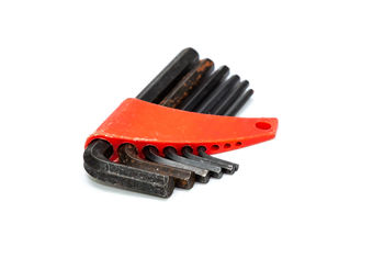 Close-up of machine part against white background
