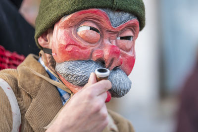 Carnival in carnia. sauris, masks of the religious and pagan tradition. italy