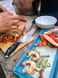 High angle view of man preparing food on table