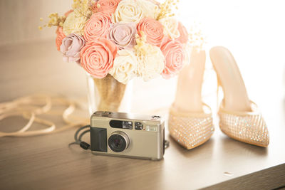 Close-up of white rose on table