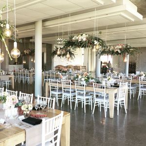 Empty chairs and tables in restaurant