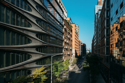 Low angle view of skyscrapers against sky