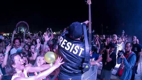 Panoramic view of people at music concert