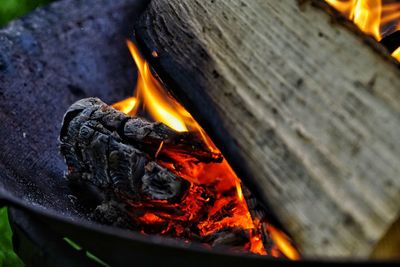 Close-up of fire burning in wood