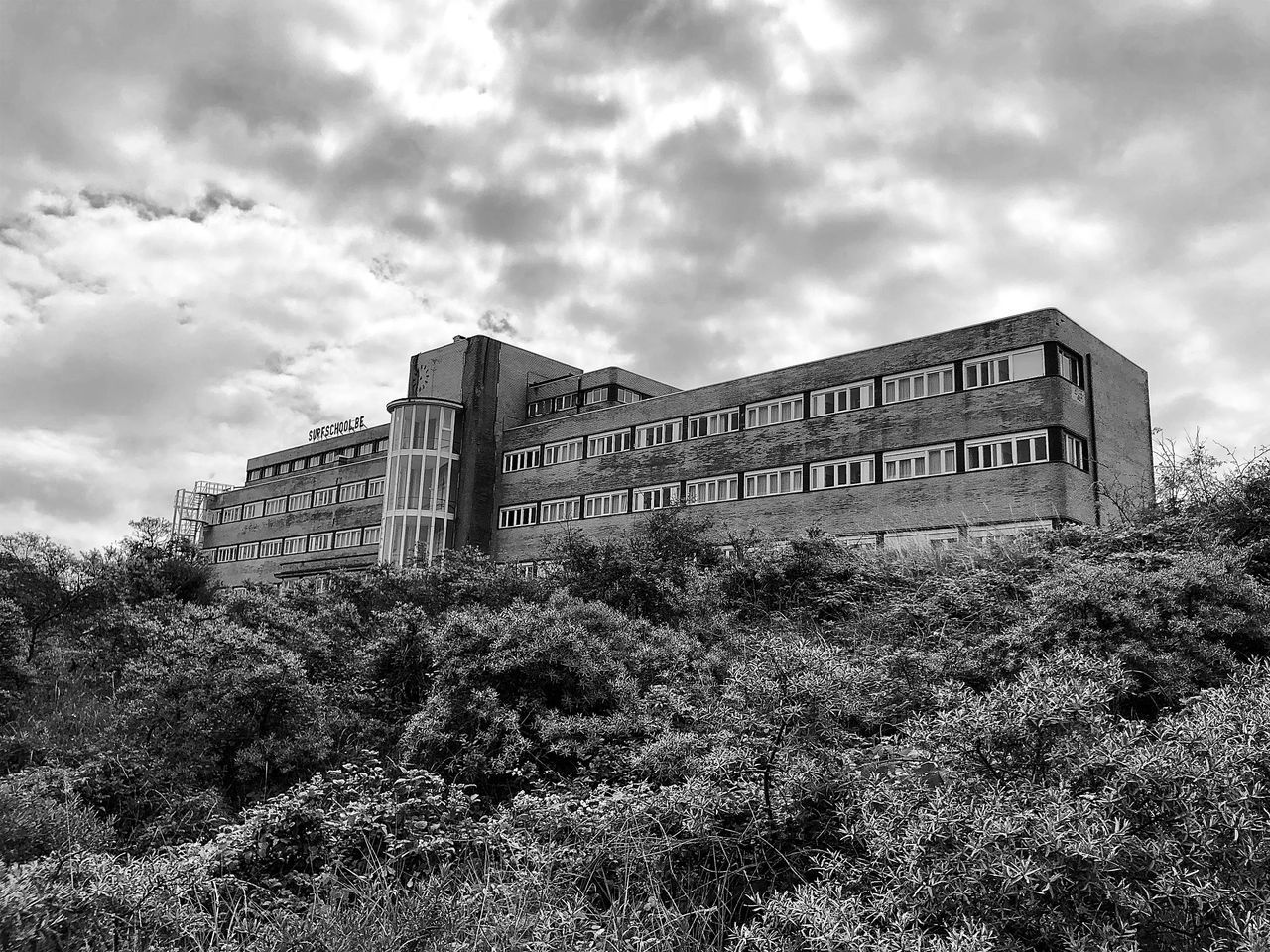 LOW ANGLE VIEW OF ABANDONED BUILDING