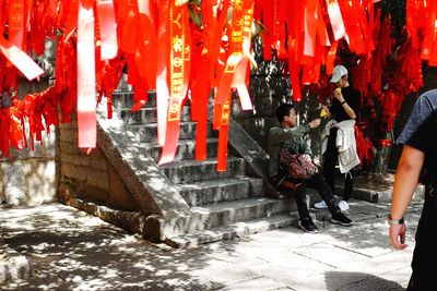 Low section of people relaxing at temple