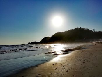 Scenic view of sea against clear sky during sunset