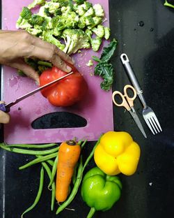 High angle view of vegetables on cutting board