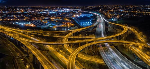 High angle view of illuminated city at night