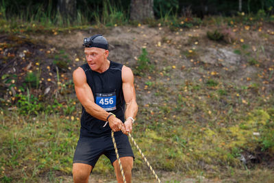 Full length of man standing on land