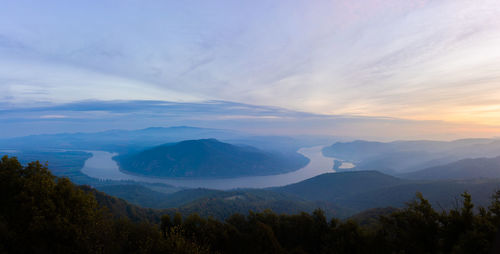 Scenic view of mountains against sky during sunset