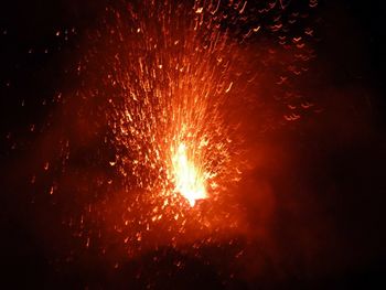 Firework display at night