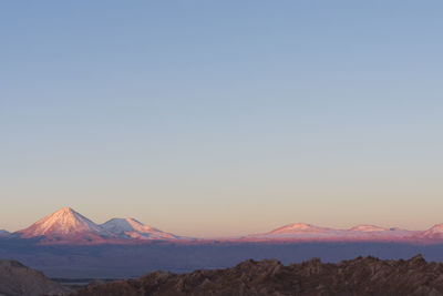 Scenic view of mountains against clear sky