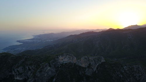 Scenic view of sea against clear sky during sunset
