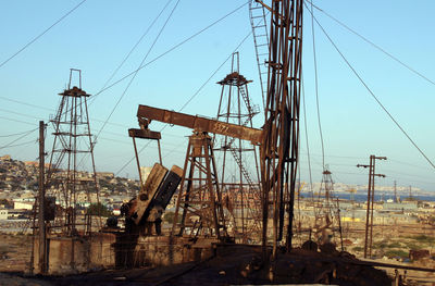 Electricity pylon against sky