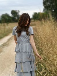 Woman standing on field