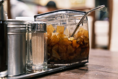 Close-up of drink in glass jar on table