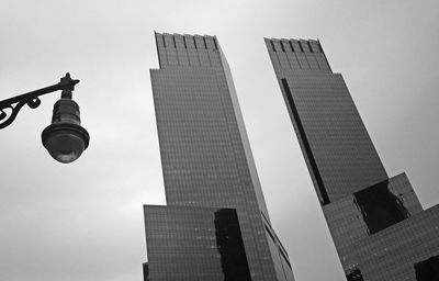 Low angle view of skyscrapers against clear sky