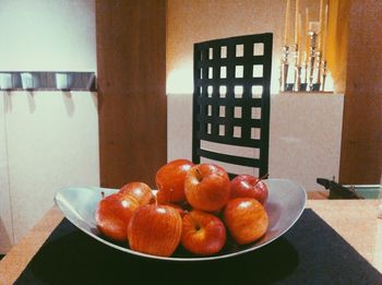 Close-up of fruits on table at home