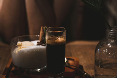 Close-up of beer glass on table