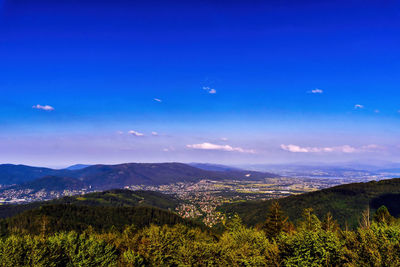 Scenic view of landscape against blue sky in bielsko biala in south poland 