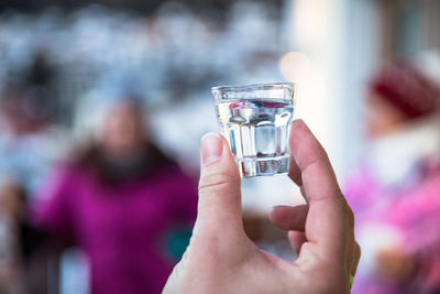 Close-up of hand holding drink