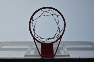 Low angle view of basketball hoop against sky