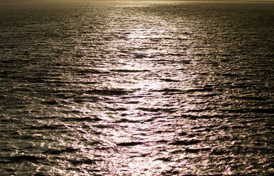 High angle view of rippled water at sunset