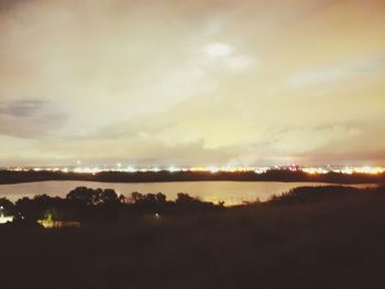 Scenic view of silhouette landscape against sky during sunset