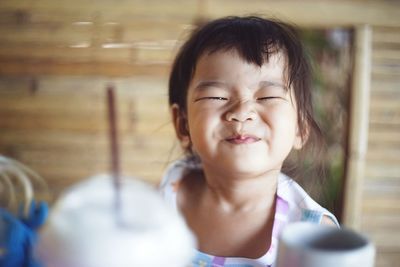 Close-up portrait of smiling girl