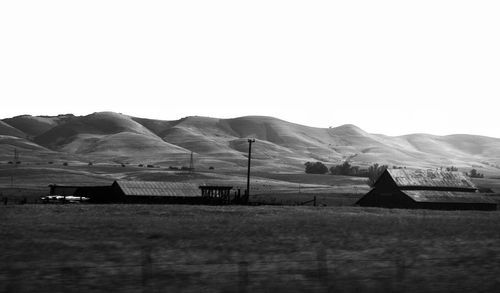 Landscape with mountains against clear sky