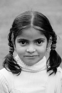 Close-up portrait of smiling girl