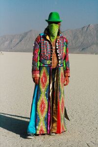 Full length of a man standing in desert
