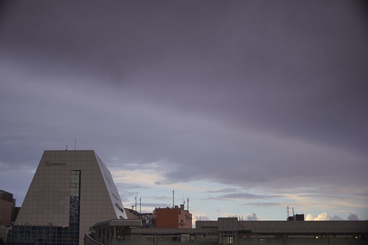 architecture, sky, built structure, building exterior, development, engineering, storm cloud, cloud - sky, modern, day, high section, cloudscape, city life, no people, facade, tourism