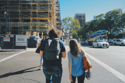 Woman walking on city street