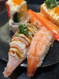 Close-up of sushi served on plate