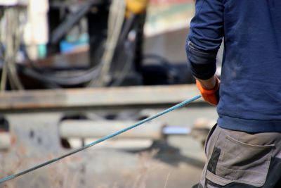 Midsection of man working at construction site